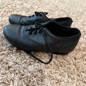 Revolution style #581 black tap shoe. Size 3.0